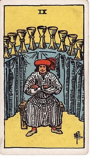 Devítka pohárů — tarot karta Rider-Waite-Smith (Nine of Cups)